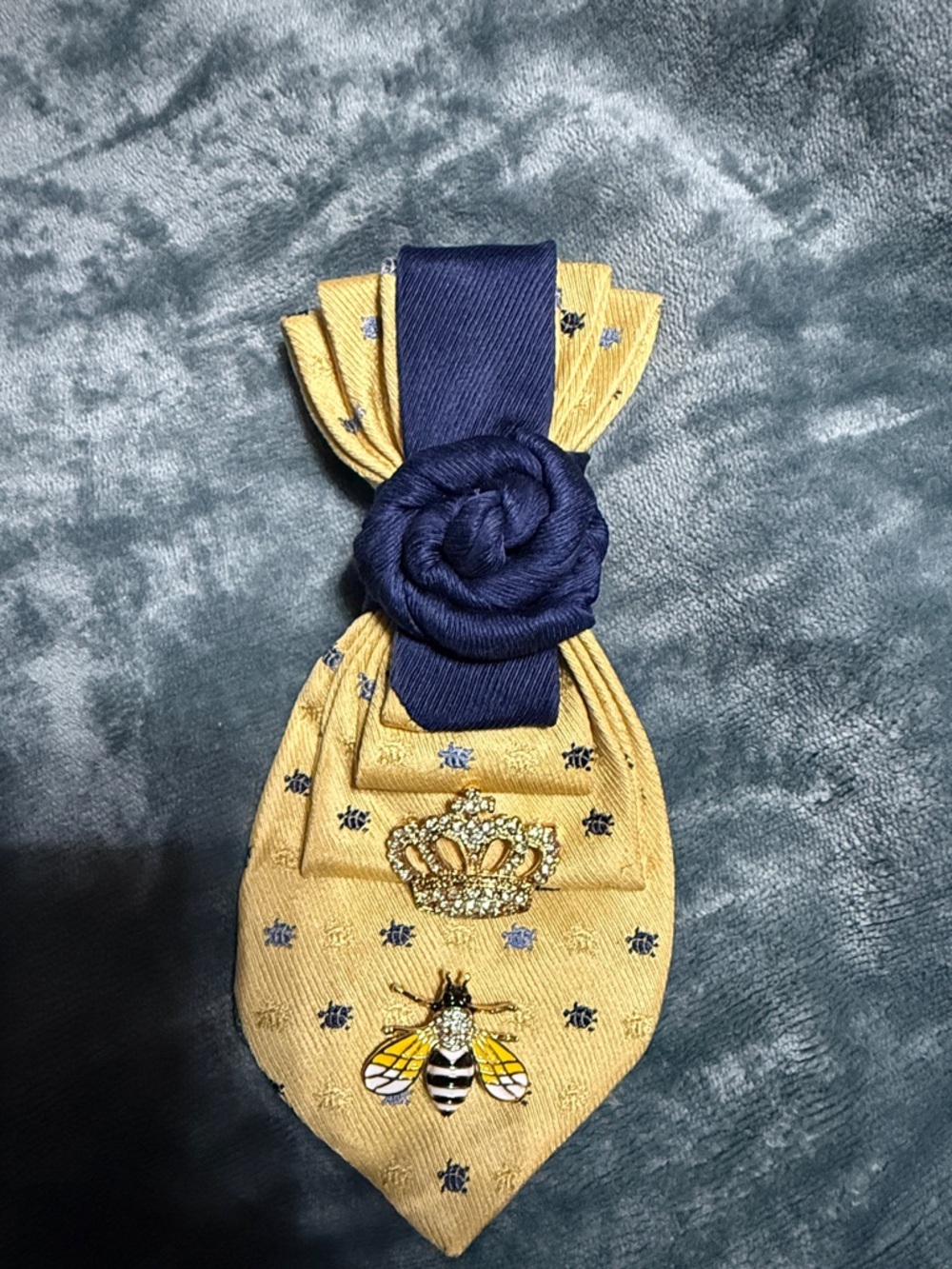 Yellow and Navy Tie Necklace with Gold Crown and a Bumblebee with rhinestones.